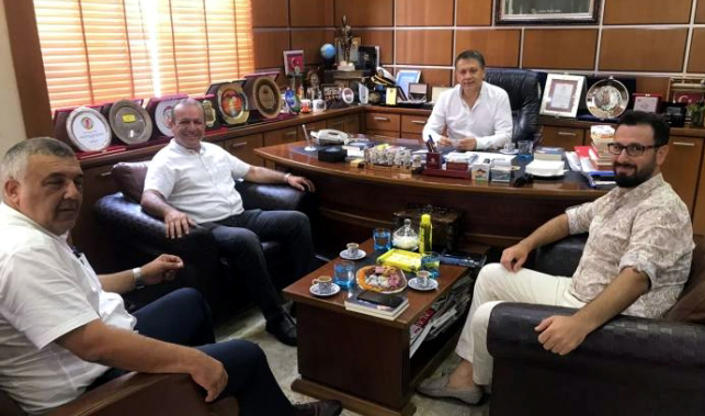 Kıbrıslı bakandan Dim'e tebrik ziyareti