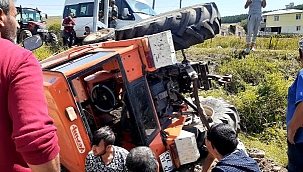 TRAKTÖR ŞARAMPOLE YUVARLANDI: 2 YARALI