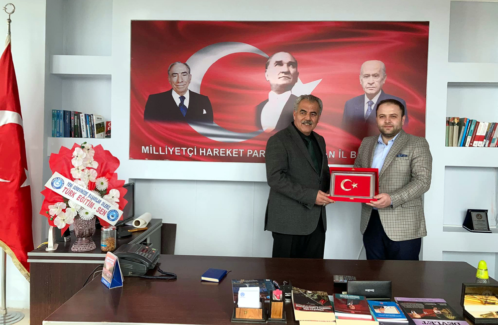 AK PARTİ'DEN MHP'YE HAYIRLI OLSUN ZİYARETİ