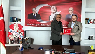 AK PARTİ'DEN MHP'YE HAYIRLI OLSUN ZİYARETİ