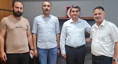 Candar Yılmaz'dan Ekmen'e hayırlı olsun ziyareti