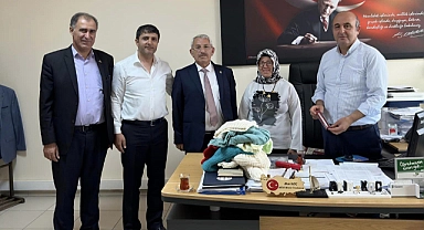 Başkan Aydemir ve yönetiminden İhtiyaç sahibi çocuklara giysi yardımı