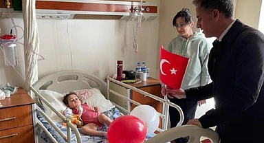 Askeroğlu, hastanede tedavi gören çocukların bayramını kutladı