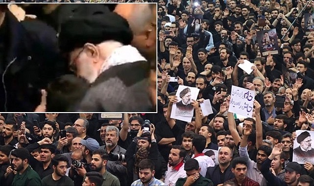 Hamaney, helikopter kazasında ölenlerin çocuklarına sarılarak teselli etti