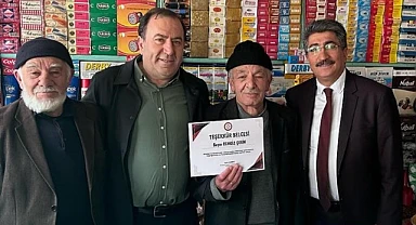 Zincir marketlere rağmen ayakta kalan bakkala teşekkür belgesi