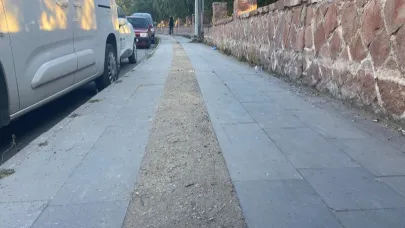 Belediye bunu da yaptı: görme engellilerin kullandığı yürüyüş bantlarına beton döktü